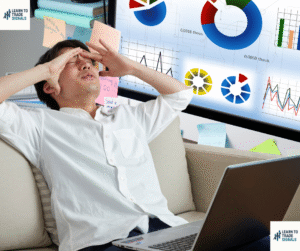 Trading Psychology Man Looking exasperated at charts